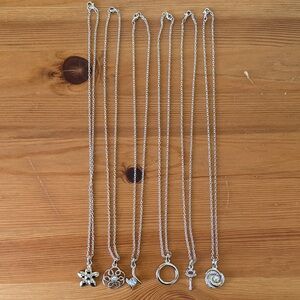 Lot of Silver Tone Pendant Necklace - Floral, Filigree, Moon & Circle Options